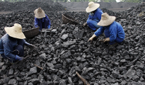 Chinese people sorting coal